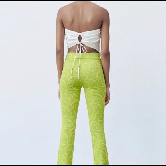NWT Groovy Zara Flare Fitted Pants in groovy neon shades and pattern - Picture 3 of 7